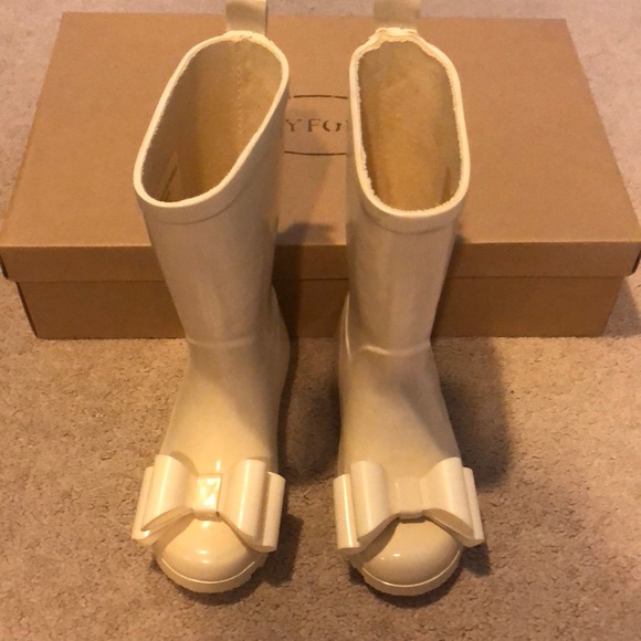 cream rain boots
